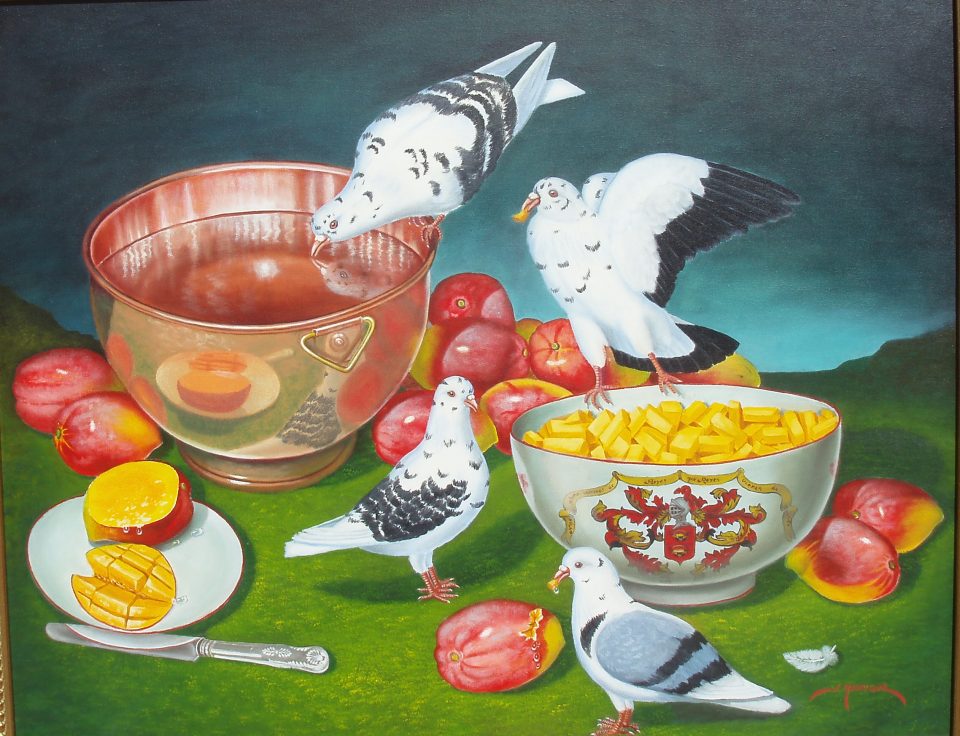 Palomas comiendo mangos